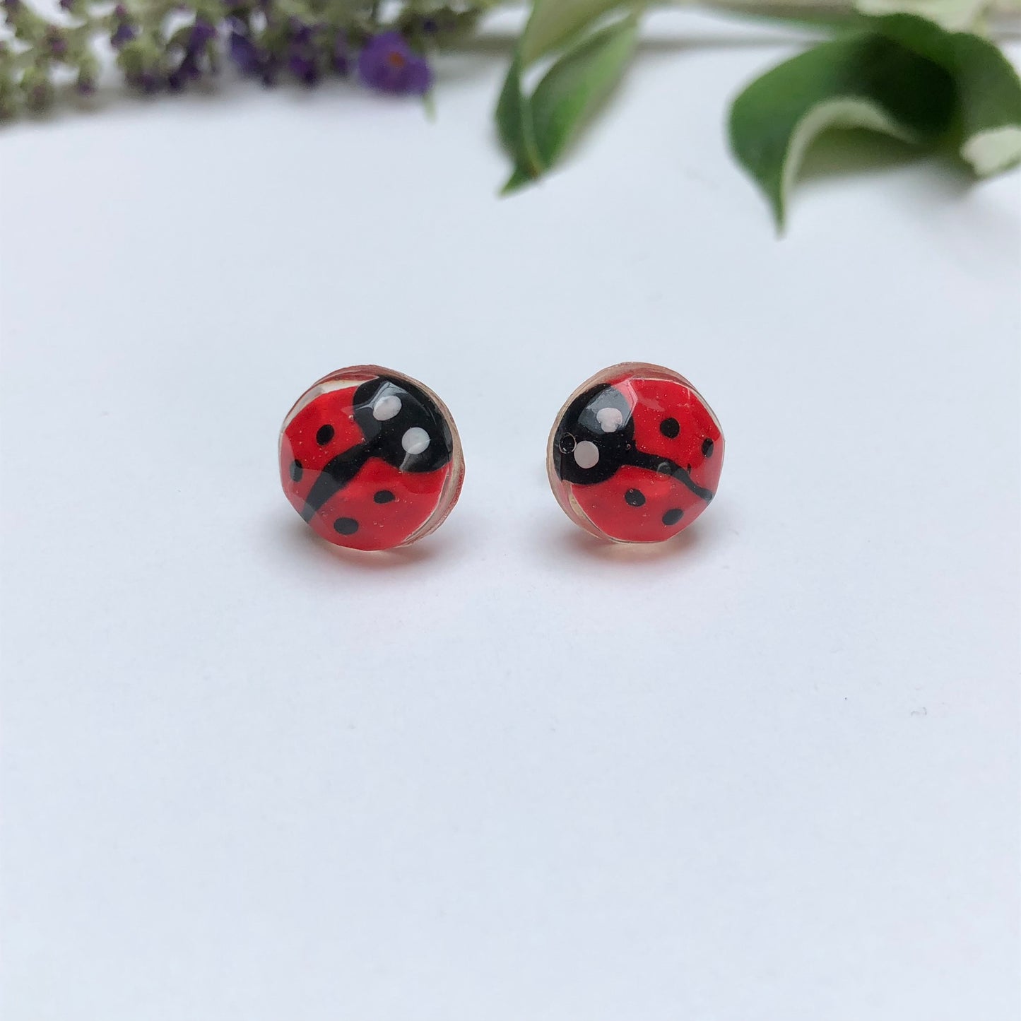 Miniature Handmade polymer clay ladybirds in crystal clear resin stud β¨π Add a whimsical touch to your everyday style with our Miniature Handmade Polymer Clay Ladybird Earrings, beautifully cast in crystal clear epoxy resin. These vibLadybird Stud earringsPadpod & BerrieMy Fairytale GiftsMiniature Handmade polymer clay ladybirds