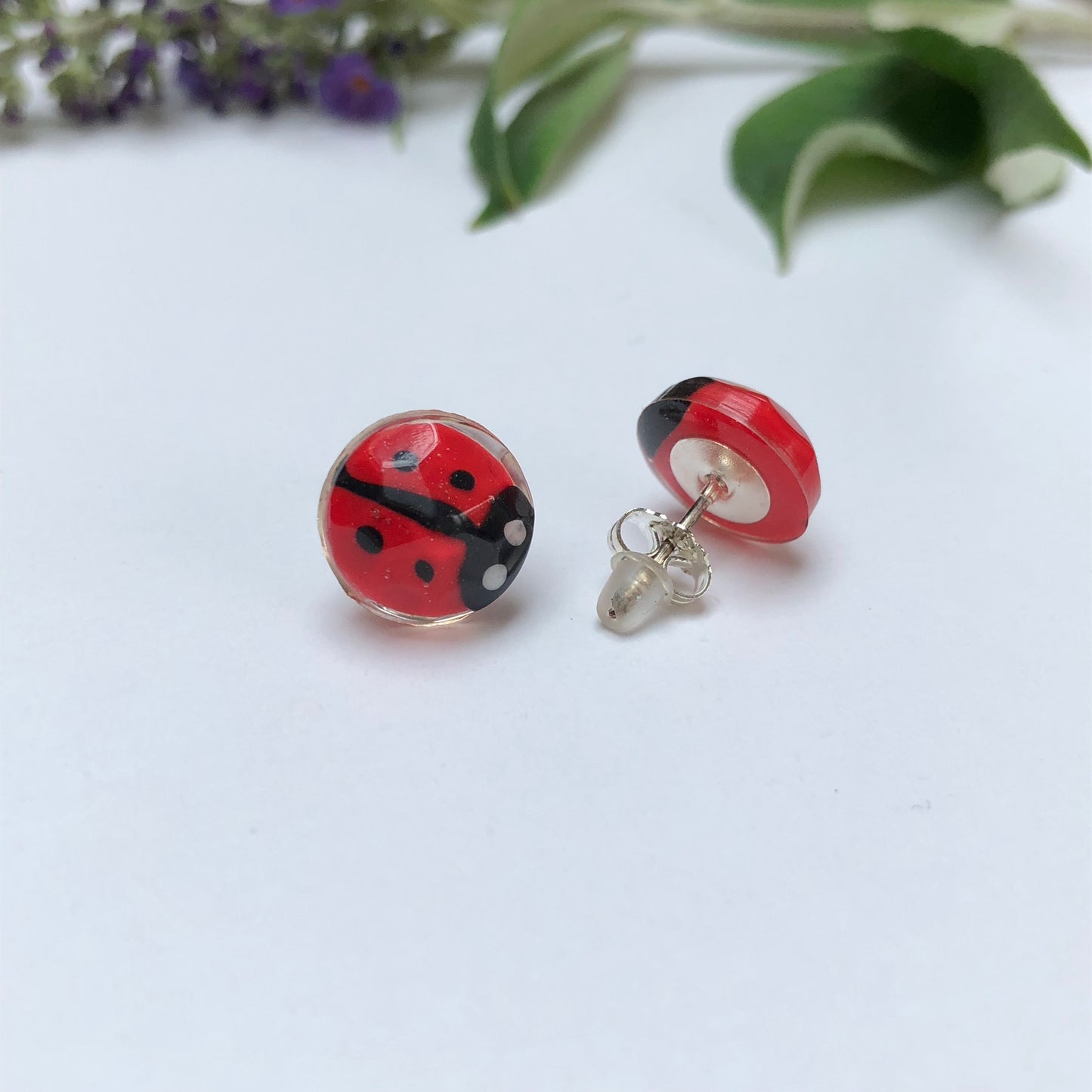 Miniature Handmade polymer clay ladybirds in crystal clear resin stud β¨π Add a whimsical touch to your everyday style with our Miniature Handmade Polymer Clay Ladybird Earrings, beautifully cast in crystal clear epoxy resin. These vibLadybird Stud earringsPadpod & BerrieMy Fairytale GiftsMiniature Handmade polymer clay ladybirds