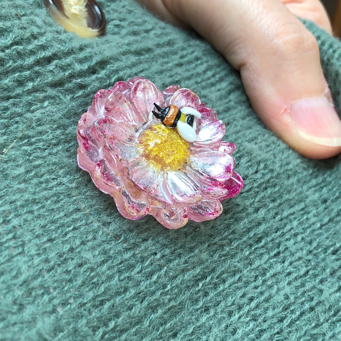 Miniature Handmade Polymer Clay Bee on Epoxy Resin Flower Lapel Pin Br๐๐ธ Buzzing with Elegance: Introducing our Miniature Handmade Polymer Clay Bee on Epoxy Resin Flower Lapel Pin Brooch! ๐ธ๐Looking to add a touch of whimsy and natuBee lapel pinPadpod & BerrieMy Fairytale GiftsEpoxy Resin Flower Lapel Pin Brooch