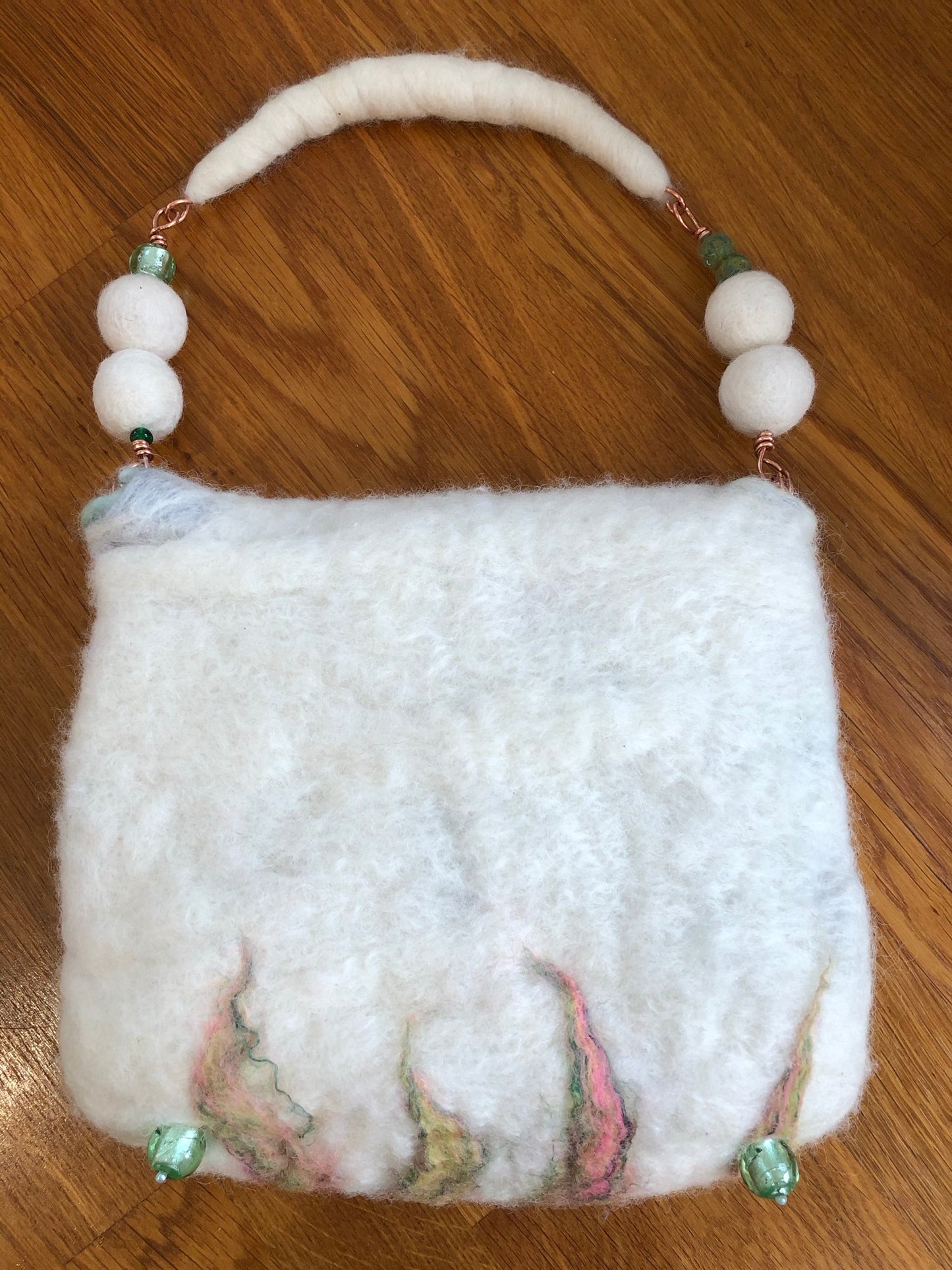 Merino wool hand wet felted handbag - Flora with detachable butterfly Merino wool hand wet felted handbag - Flora with detachable butterfly brooch.
One of a kind unique adorable hand made gift fabulous to elevate your outfit for a weddhandbagPadpodandberrieMy Fairytale GiftsMerino wool hand wet felted handbag - Flora