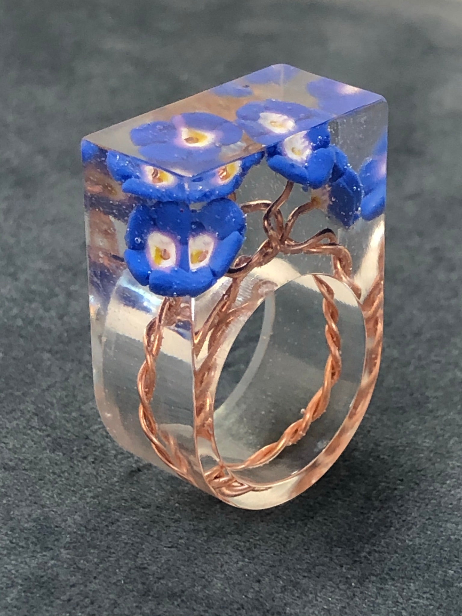Forget me not Ring, is a handmade crystal clear epoxy resin ring