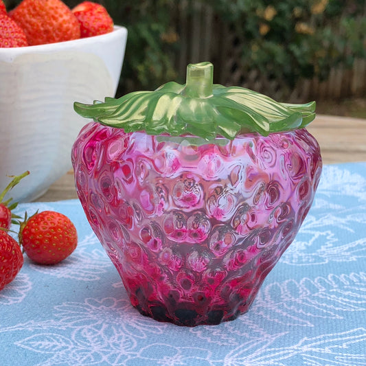Handmade Strawberry Jar in Epoxy ResinIntroducing our enchanting Handmade Resin Strawberry Jar, a delightful fusion of whimsy and functionality that will add a touch of magic to your home decor! 🍓✨Craftepoxy resin jarP & BMy Fairytale GiftsHandmade Strawberry Jar