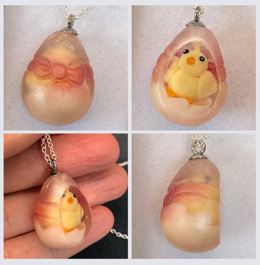 my hand sculpted polymer clay chicSecret Egg necklace Ooak jewellery, my hand sculpted polymer clay chick inside hand poured epoxy resin egg which is made from my handmade silicone mold. Secret Egg nnecklacePadpodandberrieMy Fairytale Giftshand sculpted polymer clay chick inside hand poured epoxy resin egg