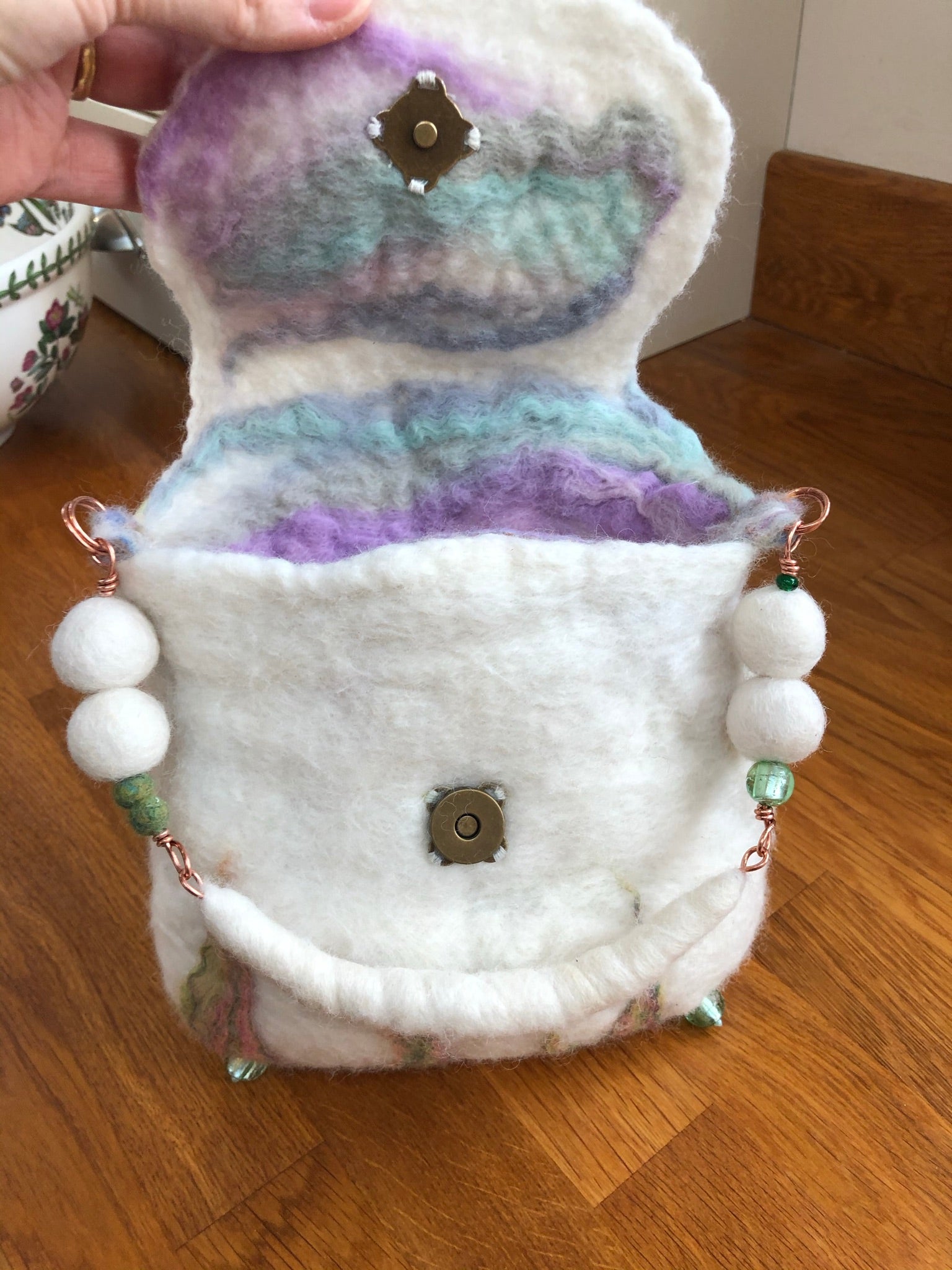 Merino wool hand wet felted handbag - Flora with detachable butterfly Merino wool hand wet felted handbag - Flora with detachable butterfly brooch.
One of a kind unique adorable hand made gift fabulous to elevate your outfit for a weddhandbagPadpodandberrieMy Fairytale GiftsMerino wool hand wet felted handbag - Flora