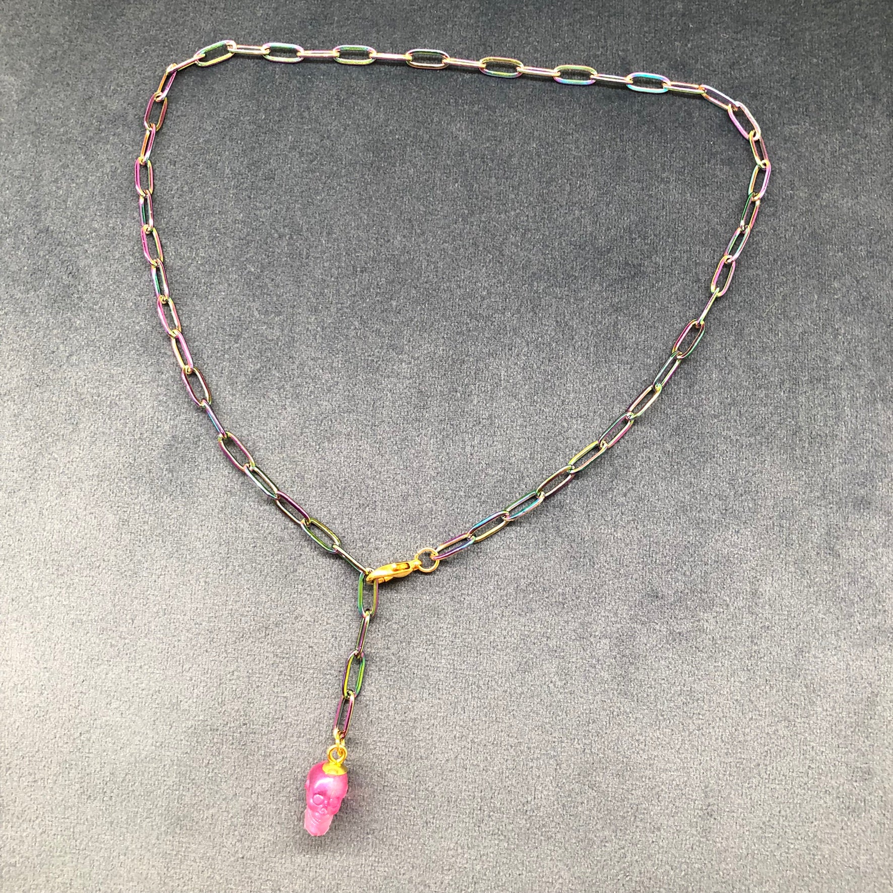 Rainbow Candy Skull necklace made to orderRainbow Candy Skull necklace purple or pink skull, rainbow paper chain with coloured resin skull from handmade silicone mould. 
 
Made to Order creation will take apPadpodandberrieMy Fairytale GiftsRainbow Candy Skull necklace made